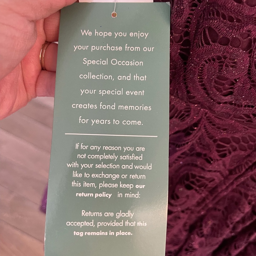 Pretty feminine plum colored dress with sparkle.